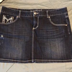 Maurice’s dark jean shirt